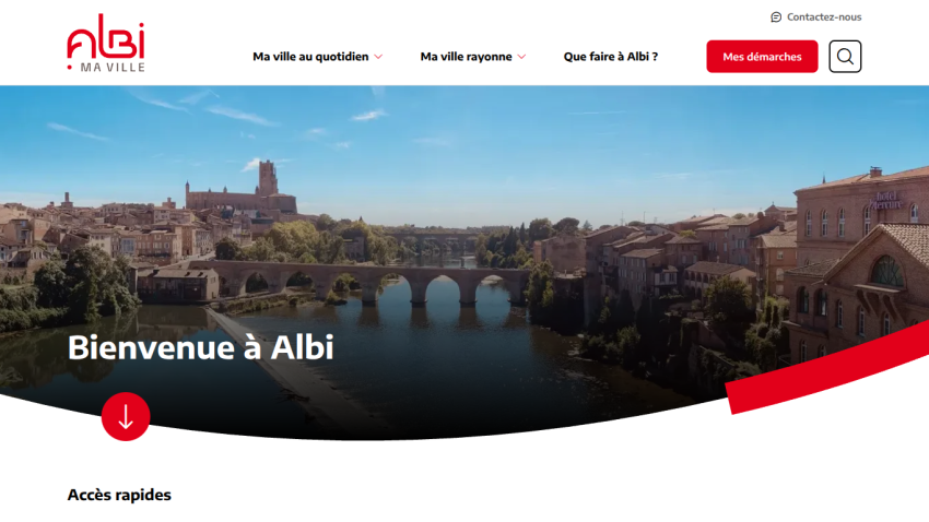 Welcome to Albi city website with navigation menu and a scenic river view with historic buildings