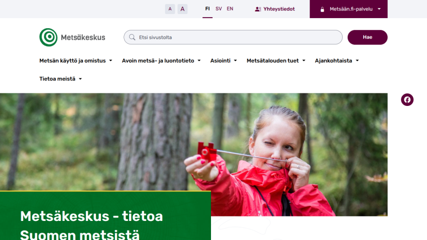 Metsäkeskus website with navigation menu, search bar, and hero image of a woman in a red jacket measuring in a forest