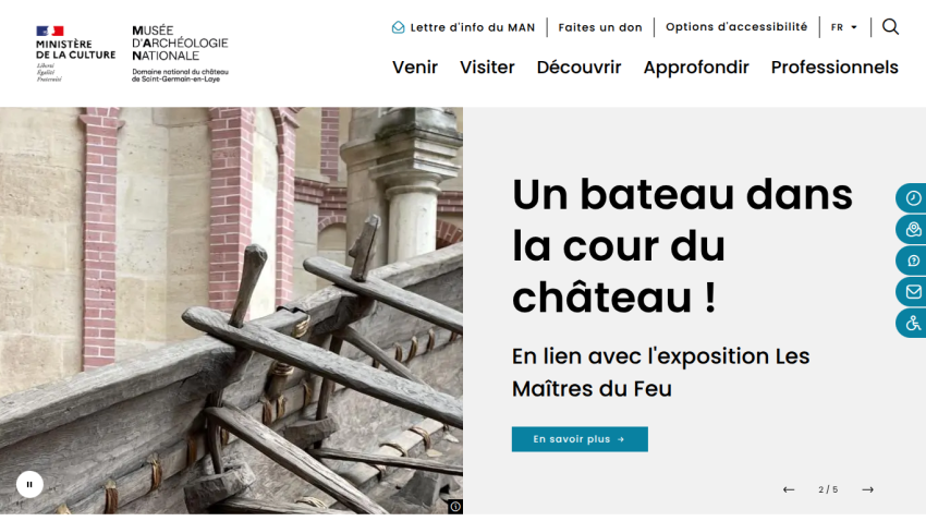 Musée d'Archéologie Nationale website showing a wooden boat exhibit linked to the 'Les Maîtres du Feu' exhibition