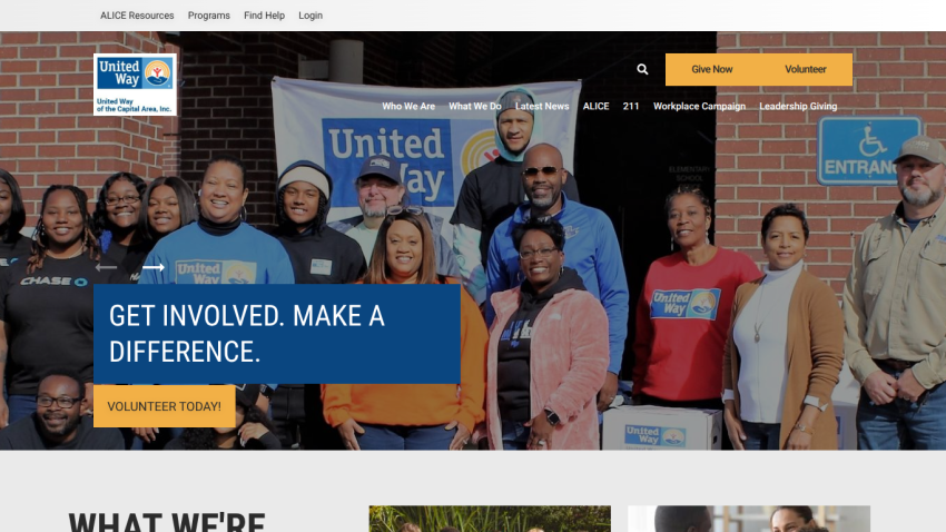 Homepage with navigation bar, large hero image featuring a woman with a laptop, and headline about AI-powered content creation