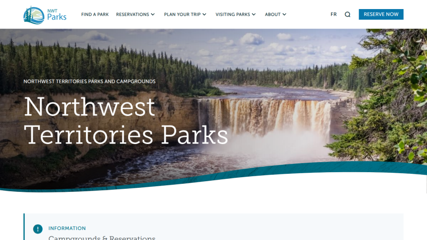 Homepage with navigation bar, large hero image of a mountain landscape, and headline 'Explore the world with us'