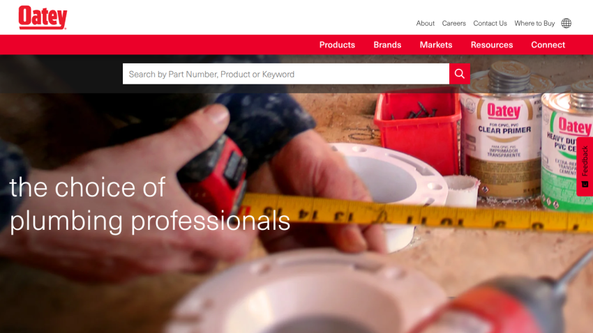 Oatey website homepage with navigation bar and hero section promoting plumbing products