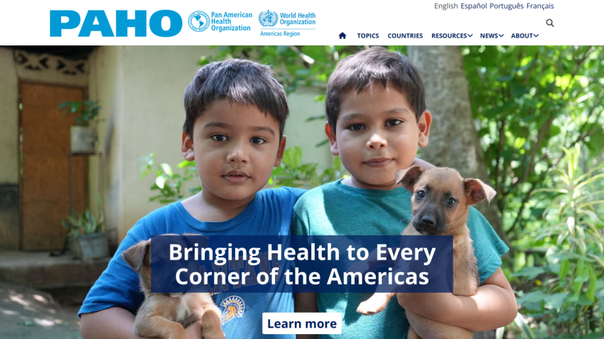Homepage of PAHO featuring two children holding puppies with the slogan about health in the Americas.
