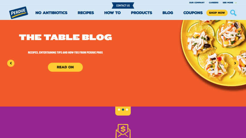 Homepage of The Table Blog with navigation menu and a call-to-action button on an orange background featuring a plate of food