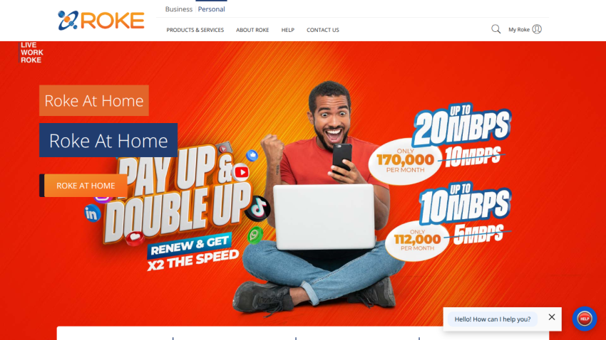 Roke At Home internet service promotion with speed upgrade offers and smiling man holding a laptop