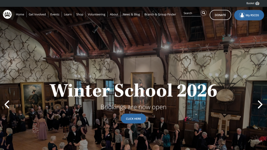 Winter School 2026 bookings open with people dancing in a decorated hall