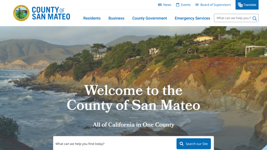 Homepage of San Mateo County with a scenic coastal image and welcome message.