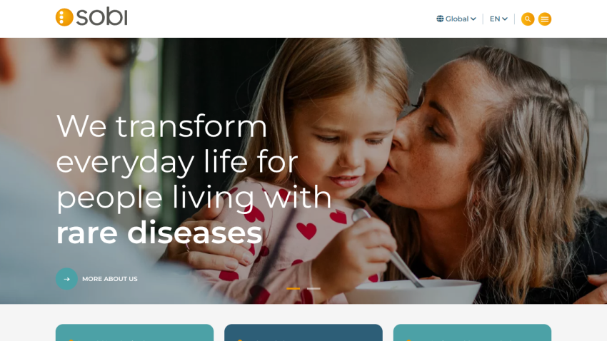 Homepage hero section with text about transforming life for people with rare diseases and a woman kissing a child