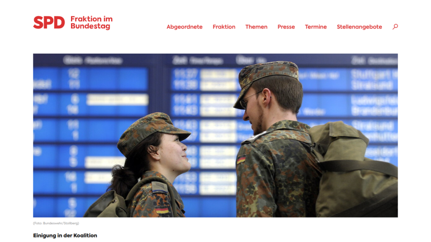 SPD Bundestag faction website with navigation links and hero image of two soldiers in uniform at a train station