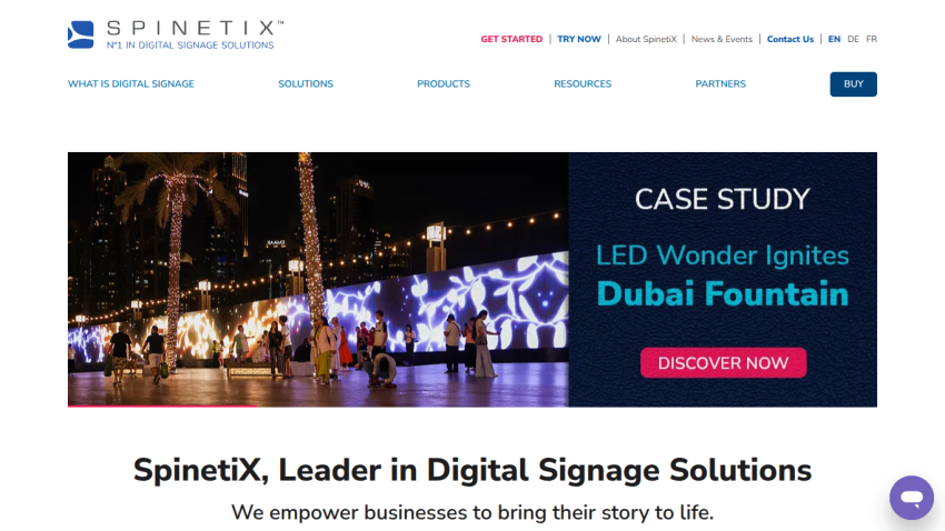SpinetiX homepage featuring a case study on Dubai Fountain and company tagline.