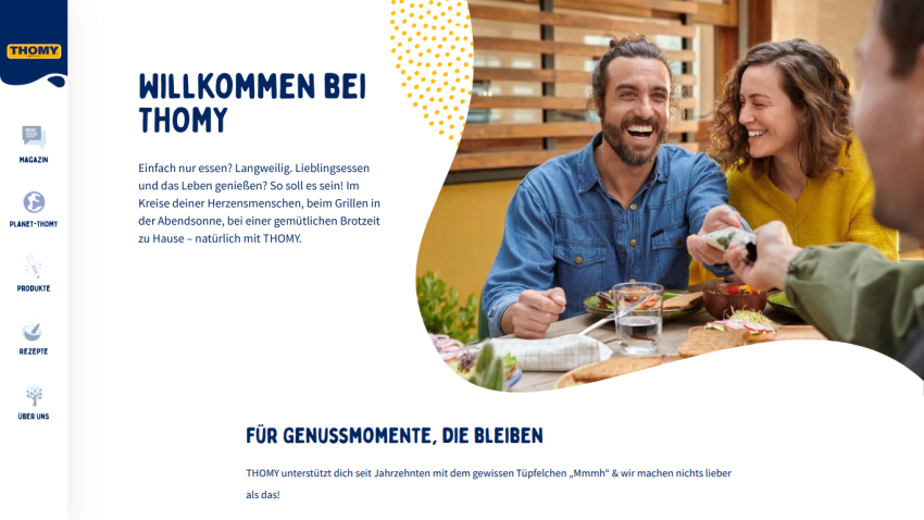 Welcome page of Thomy with navigation menu and smiling people enjoying food outdoors
