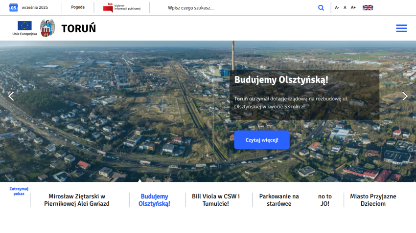 Homepage of Toruń with a panoramic view and a call to action for a local initiative.