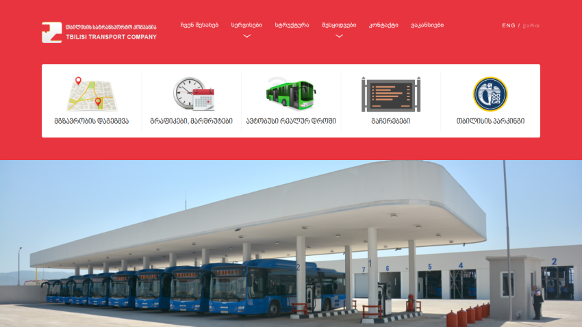 Tbilisi Transport Company website with navigation icons and hero image of blue buses at a depot