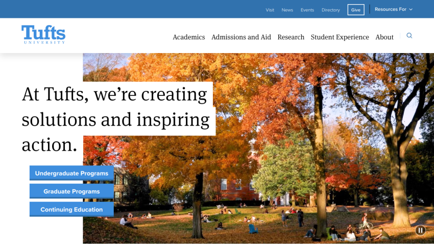 Tufts University homepage featuring a fall scene with a tagline about creating solutions and inspiring action.