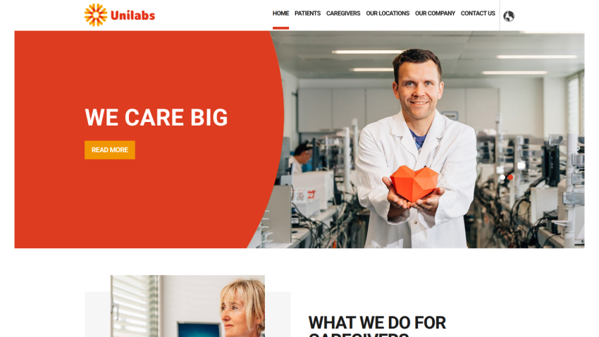 Unilabs homepage with navigation menu and hero section featuring a scientist holding a heart model and text 'WE CARE BIG'