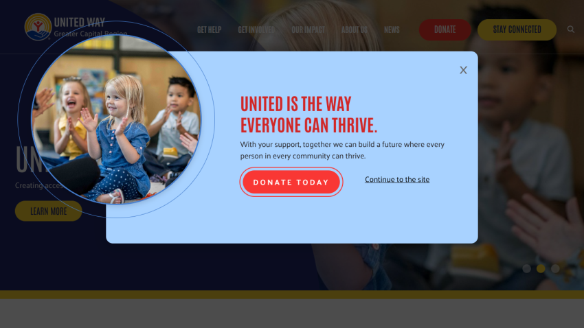 Homepage with navigation bar, large hero image of a mountain landscape, and headline 'Explore the World with Us'