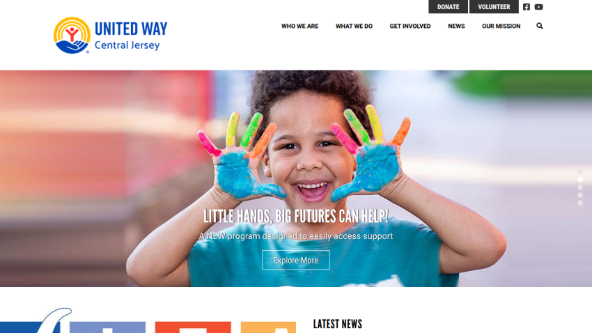 Homepage with navigation bar, large hero image of a smiling woman, and headline about a new product launch