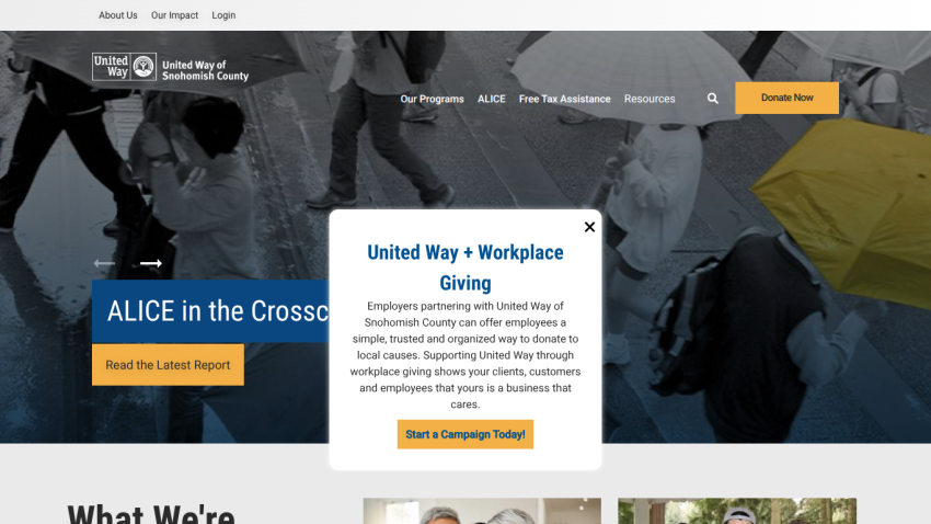 Homepage with navigation bar, large hero image showing a mountain landscape, and headline 'Explore the World with Us'