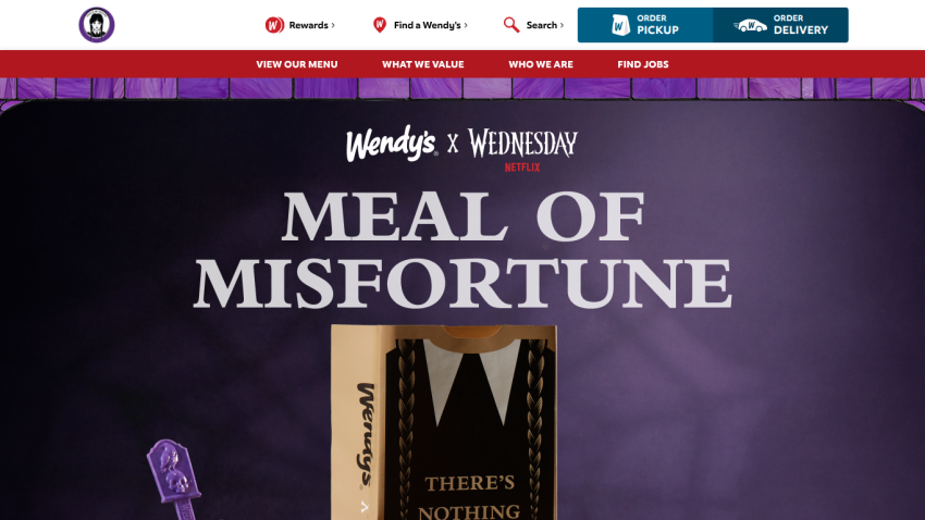 Wendy's promotional banner for 'Meal of Misfortune' with a dark theme and key text highlighted.
