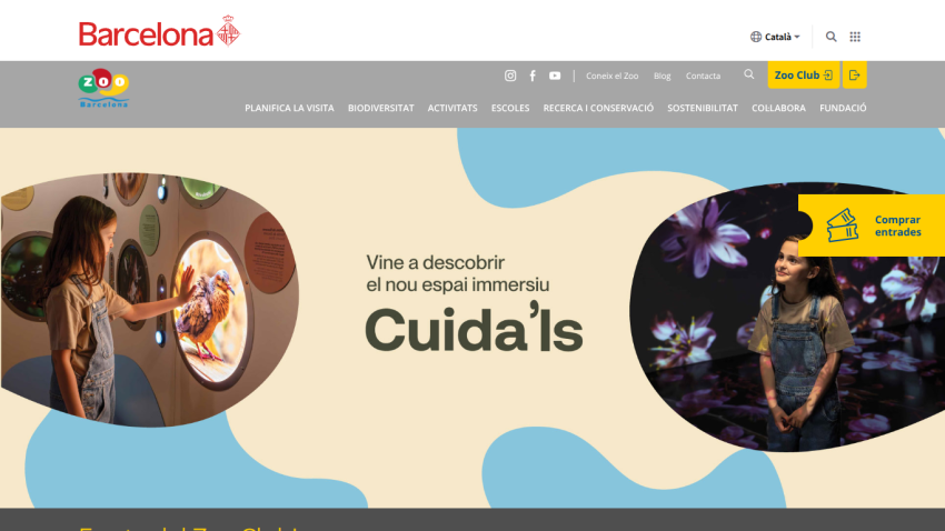 Barcelona Zoo website promoting a new immersive space with images of children interacting with exhibits and a ticket purchase button