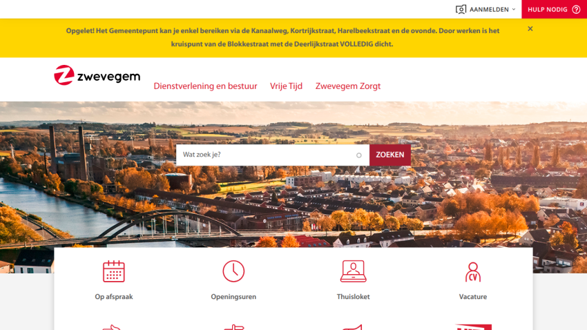 Zwevegem municipal website with navigation links, search bar, and autumn cityscape background