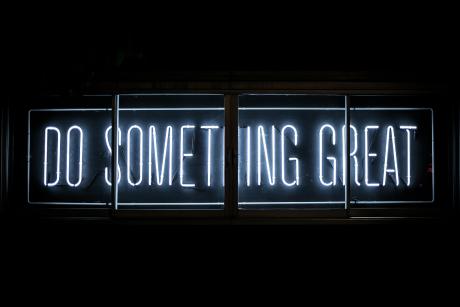 Do Something Great Neon Signage on black background
