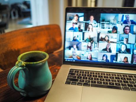 Zoom meeting going on in laptop computer