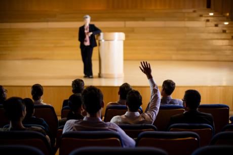 female business executive giving a speech