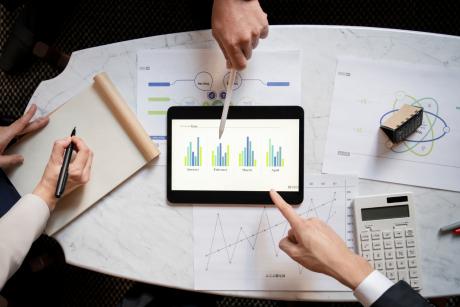 business people working with ipad