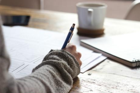 A girl writing notes