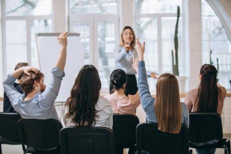 Female speaker giving presentation