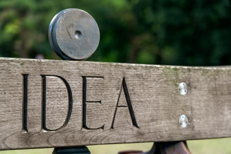 Idea etched on to wood