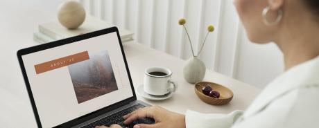 Woman looking at laptop
