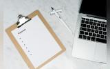 A cardboard with a sheet that says tutorial