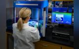 This image depicted a Centers for Disease Control and Prevention (CDC) scientist interacting with her Caliper LifeSciences’ Zephyr Molecular Biology Workstation, working with samples to be tested using a real-time PCR machine, known as a themocycler (see PHIL 22904), in order to identify the various types of poliovirus contained therein. The data from this analysis is stored in a computer, while the software further analyzes the data before being reviewed by a scientist.