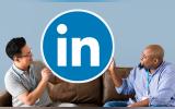 People holding a Linkedin logo