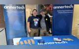 Developers Simon White and Daniel Pickering set up the Annertech booth at LocalGovCamp 2024