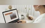 Woman looking at laptop