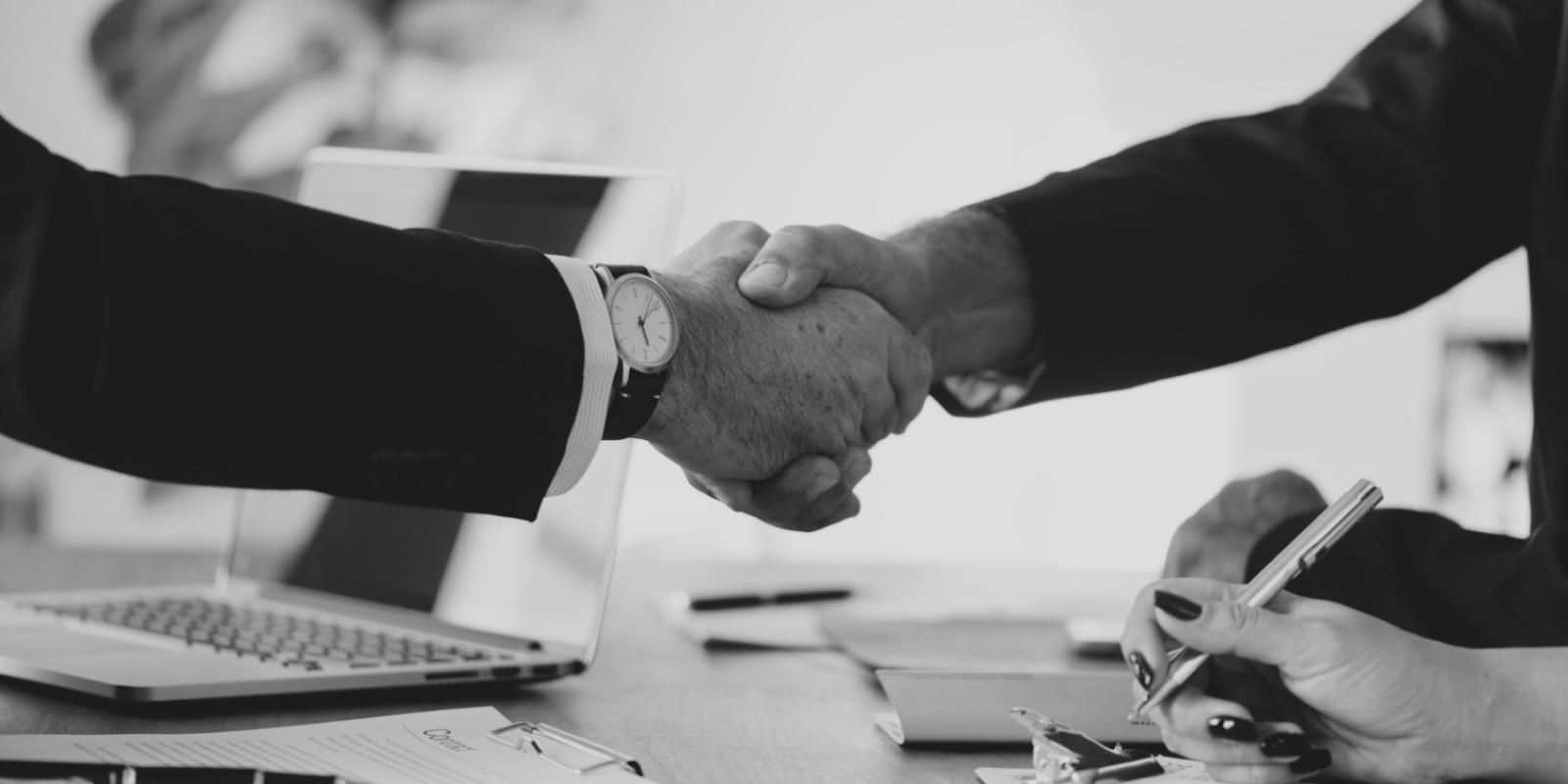 Two people shaking hands